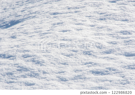 Beautiful snow surface patterns [Snowy landscape image] 122986820