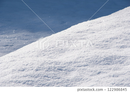 Beautiful snow surface patterns [Snowy landscape image] 122986845