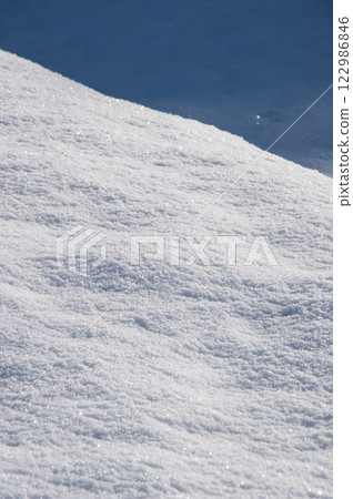 Beautiful snow surface patterns [Snowy landscape image] 122986846