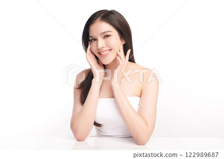 Beautiful young asian woman with clean fresh skin on white background, Face care, Facial treatment, Cosmetology, beauty and spa, Asian women portrait. Beautiful young asian woman with clean fresh skin on white background, Face care, Facial treatment, Cosmetology, beauty and spa, Asian women portrait. 122989687