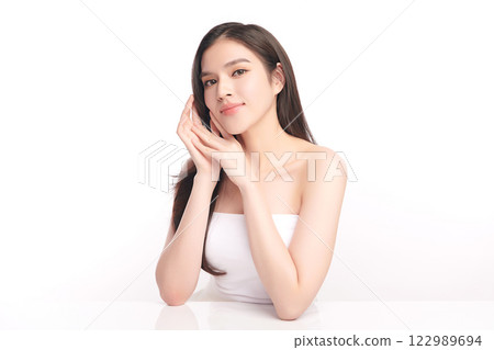 Beautiful young asian woman with clean fresh skin on white background, Face care, Facial treatment, Cosmetology, beauty and spa, Asian women portrait. 122989694