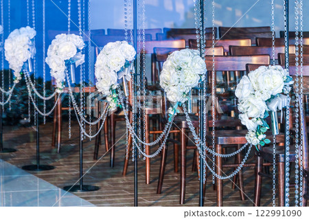 View of the wedding chapel through the glass View of the wedding chapel through the glass 122991090