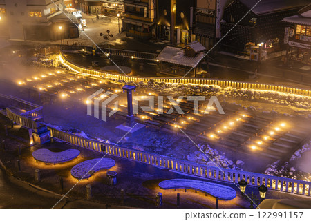 Night view of the Yubatake hot springs in Kusatsu onsen in winter Night view of the Yubatake hot springs in Kusatsu onsen in winter 122991157