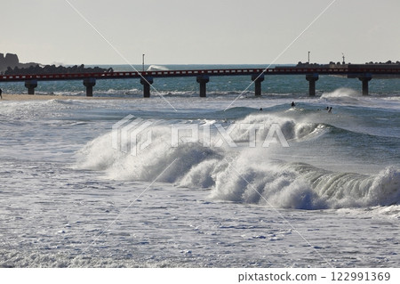 Yura Beach: White waves playing Yura Beach: White waves playing 122991369