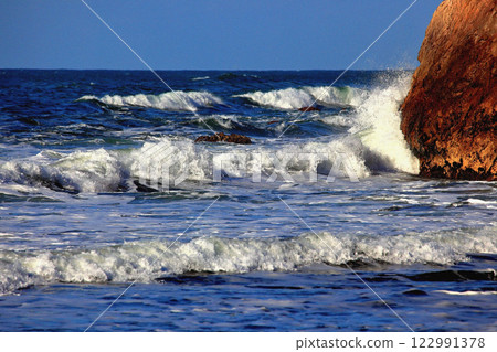 Yura Beach: White waves playing 122991378