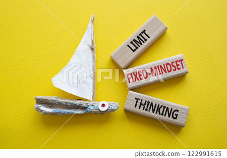 Limit fixed mindset thinking symbol. Concept words Limit fixed mindset thinking on wooden blocks. Beautiful yellow background with boat. Business concept and Limit fixed mindset thinking. Copy space. Limit fixed mindset thinking symbol. Concept words Limit fixed mindset thinking on wooden blocks. Beautiful yellow background with boat. Business concept and Limit fixed mindset thinking. Copy space. 122991615