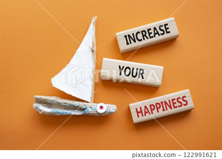 Increase your Happiness symbol. Concept words Increase your Happiness on wooden blocks. Beautiful orange background with boat. Business and Increase your Happiness concept. Copy space 122991621