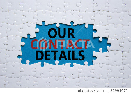 Our Contact Details symbol. Concept words Our Contact Details on white puzzle. Beautiful blue background. Business and Our Contact Details concept. Copy space. Our Contact Details symbol. Concept words Our Contact Details on white puzzle. Beautiful blue background. Business and Our Contact Details concept. Copy space. 122991671