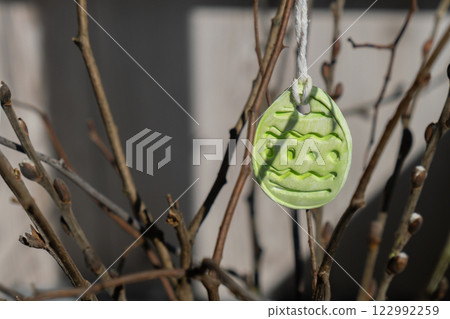 Do it yourself air dry clay crafts for Easter holiday. Decoration gift idea Handmade children craft. Step by step instruction of painting, pressing figures 122992259