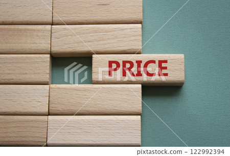 Price symbol. Concept word Price on wooden blocks. Beautiful grey green background. Business and Price concept. Copy space. Price symbol. Concept word Price on wooden blocks. Beautiful grey green background. Business and Price concept. Copy space. 122992394