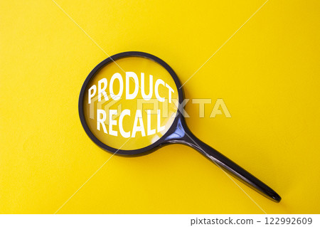 Product recall symbol. Concept words Product recall on magnifying glass. Beautiful yellow background. Business and Product recall concept. Copy space. Product recall symbol. Concept words Product recall on magnifying glass. Beautiful yellow background. Business and Product recall concept. Copy space. 122992609