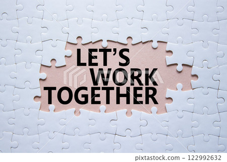 Lets work together symbol. Concept words Lets work together on white puzzle. Beautiful pink background Business and Lets work together concept. Copy space. Lets work together symbol. Concept words Lets work together on white puzzle. Beautiful pink background Business and Lets work together concept. Copy space. 122992632