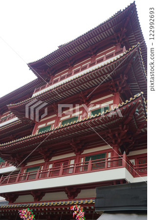 Buddha Tooth Relic Temple in Singapore, showcasing its intricate red architecture Buddha Tooth Relic Temple in Singapore, showcasing its intricate red architecture 122992693