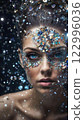 Portrait of a woman surrounded by colorful jewels floating in the air Portrait of a woman surrounded by colorful jewels floating in the air 122996036