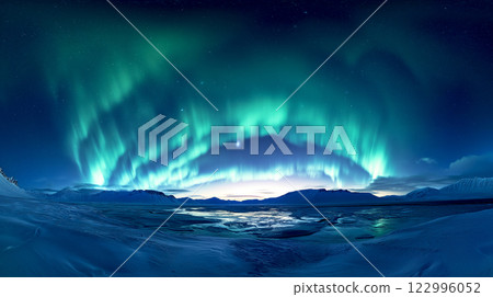 Landscape of Northern lights aurora borealis green and purple with snow mountains Reflection in the lake water at night, In Scandinavia Country Winter Season, North pole, Northern Europe 122996052
