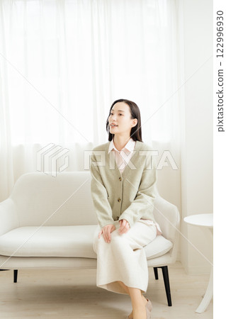 Business woman taking a break Business woman taking a break 122996930
