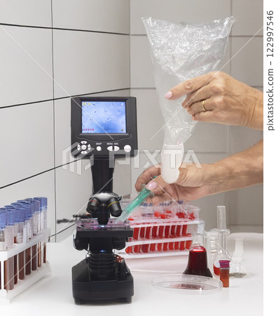 microscope and sperm in clinic 122997546