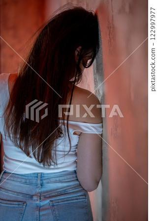 A contemplative moment in a rustic, serene setting, evoking deep thoughts and feelings A contemplative moment in a rustic, serene setting, evoking deep thoughts and feelings 122997977