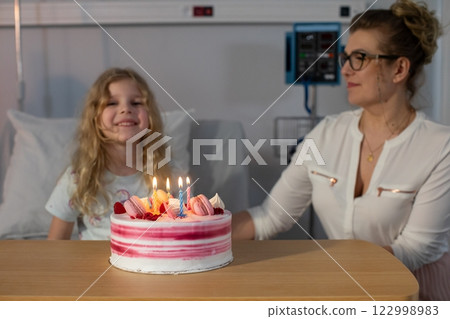 A Birthday Celebration in a Hospital Room Joyous moments filled with love and care among friends 122998983