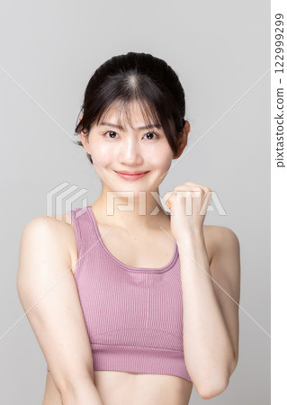 Beautiful woman in sportswear 122999299