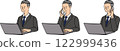 Male businessman in his 50s or 60s working on a laptop computer 3 122999436
