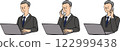 Male businessman in his 50s or 60s working on a laptop computer 1 122999438