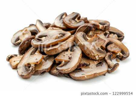 Pile of sliced roasted sliced champignons isolated on white background 122999554