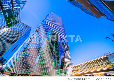 Tokyo cityscape in Japan - Yellow trains, Shibuya Scramble Square, signs, etc. - 15th Tokyo cityscape in Japan - Yellow trains, Shibuya Scramble Square, signs, etc. - 15th 122999567