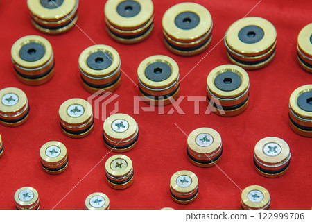 The various type of tapered screw plug on the red background. 122999706
