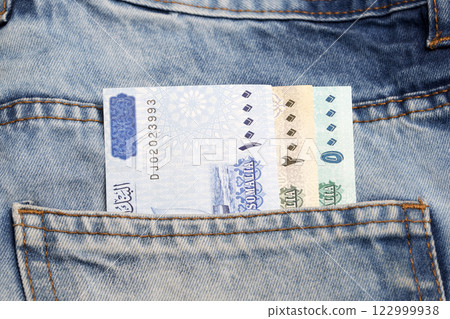 Somali Shilling in the pocket of blue jeans Somali Shilling in the pocket of blue jeans 122999938