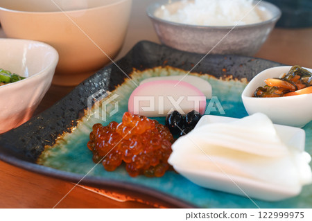 Japanese breakfast table: miso soup, rice and colorful side dishes Japanese breakfast table: miso soup, rice and colorful side dishes 122999975