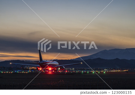 Sendai Airport at dusk, airplane taking off, Natori City, Miyagi Prefecture 123000135