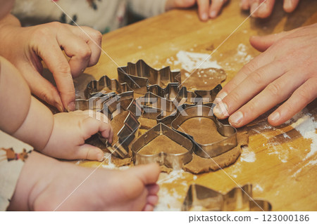 A family with children makes cookies. Close-up 123000186