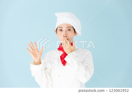 Female chef cook coat surprised Female chef cook coat surprised 123001952