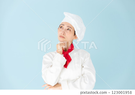 Female chef cook coat worries 123001958