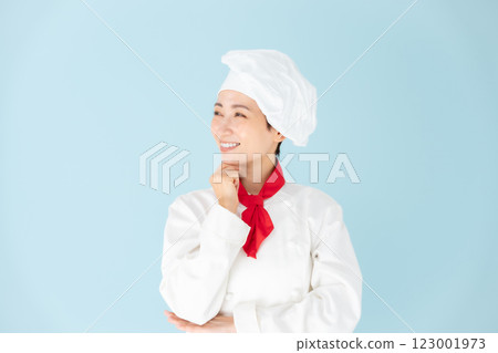 Female chef cook coat grinning 123001973