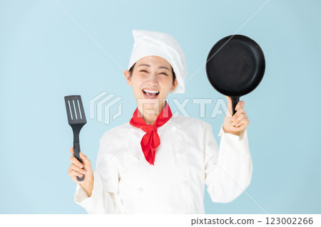 Female chef cook coat cooking Female chef cook coat cooking 123002266