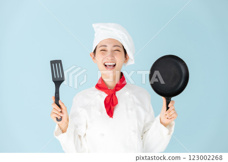 Female chef cook coat cooking Female chef cook coat cooking 123002268
