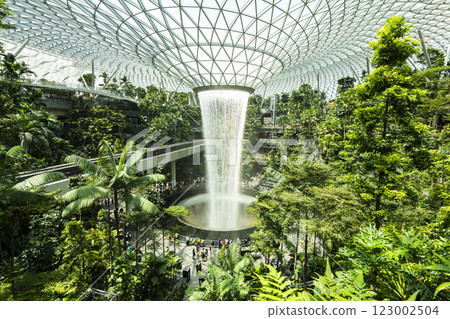 View of HSBC Rain Vortex at Jewel Changi Airport, Singapore, is the world's largest and tallest indoor artificial waterfall and surrounded by a terraced forest setting. 123002504