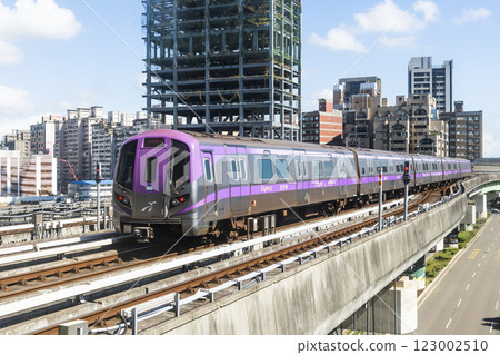 View of a Taoyuan International Airport line train running on the elevated track of the Taoyuan Mass Rapid Transit System. 123002510