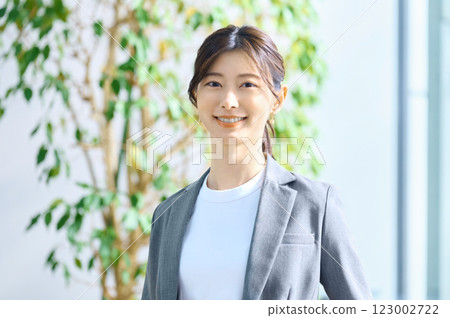 Young businesswoman working in an office. Photo courtesy of Sky Perfect TV Tokyo Media Center. Young businesswoman working in an office. Photo courtesy of Sky Perfect TV Tokyo Media Center. 123002722