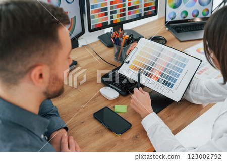Modern digital technologies. Two designers working together in the office Modern digital technologies. Two designers working together in the office 123002792
