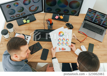 Top view. Two designers working together in the office 123002861