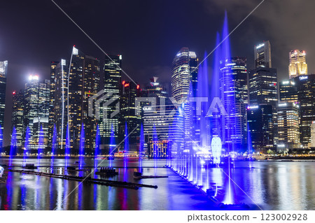 Beautiful view of the nightly music, water, and light show at Marina Bay Sands, here is an integrated resort fronting Marina Bay in Singapore. Beautiful view of the nightly music, water, and light show at Marina Bay Sands, here is an integrated resort fronting Marina Bay in Singapore. 123002928