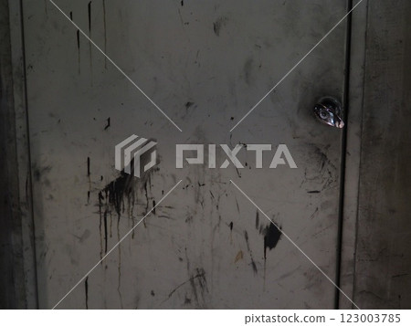 Ink-stained factory door 123003785