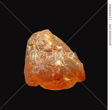 Close-Up View of Amber Specimen on Dark Background 123006902