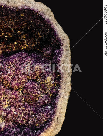Close-Up View of Amethyst Quartz in Geode on Dark Background 123006905
