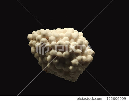 Close-Up View of Aragonite Mineral Specimen on Dark Background 123006909