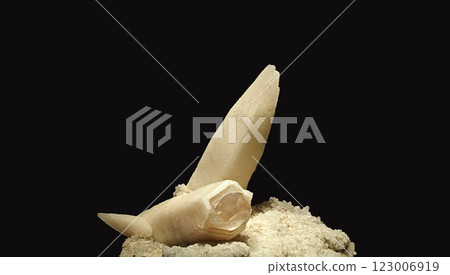 Close-Up View of Calcite Mineral Specimen on Dark Background 123006919