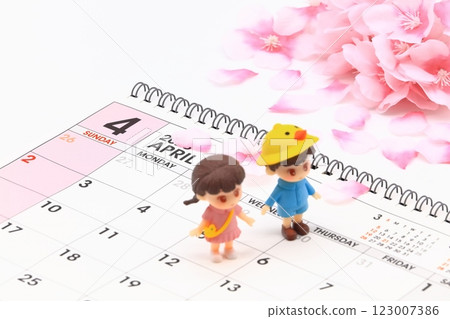 Image of a child and a calendar Image of a child and a calendar 123007386